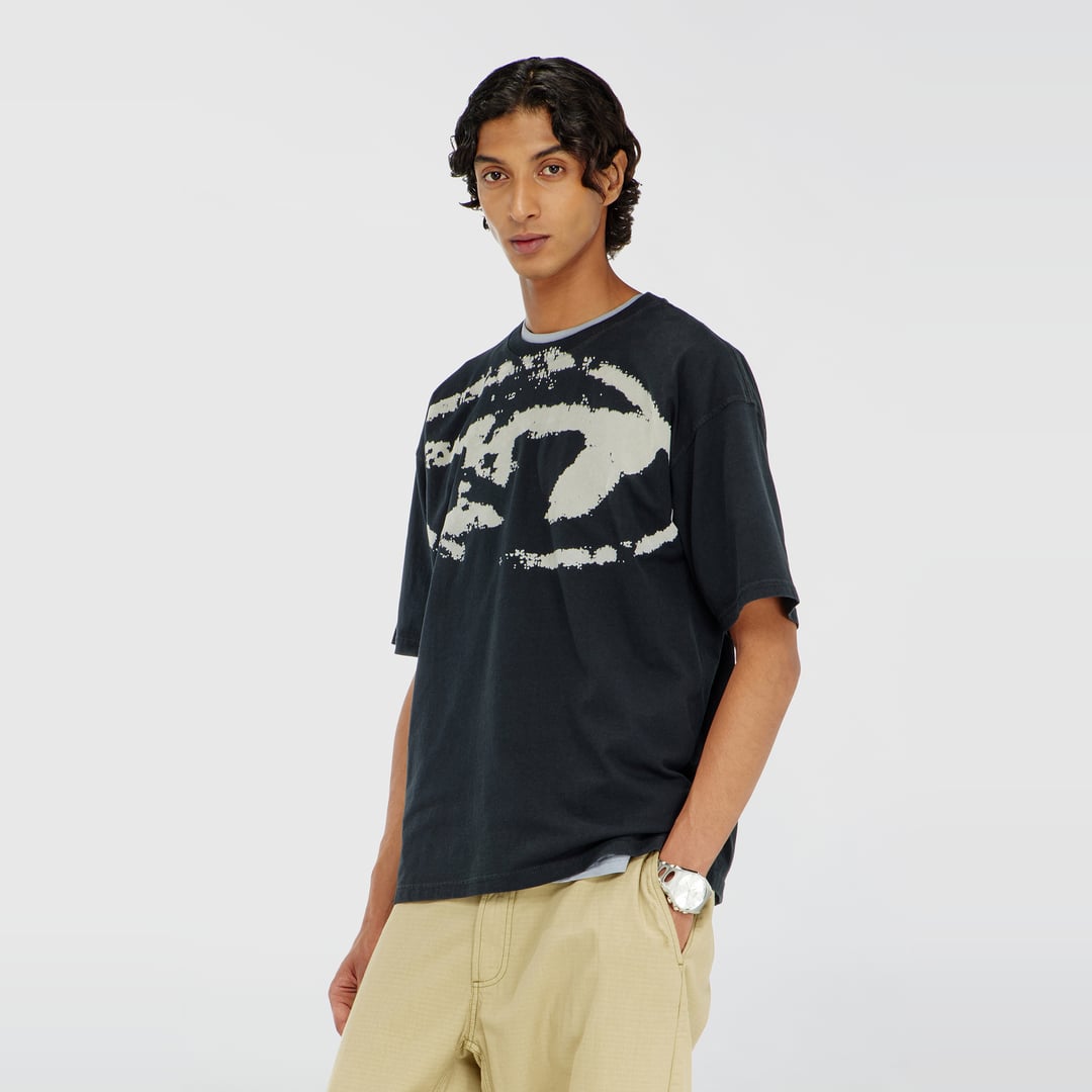 Diesel - T-shirt with distressed flocked logo - T-Shirts - Man - Black