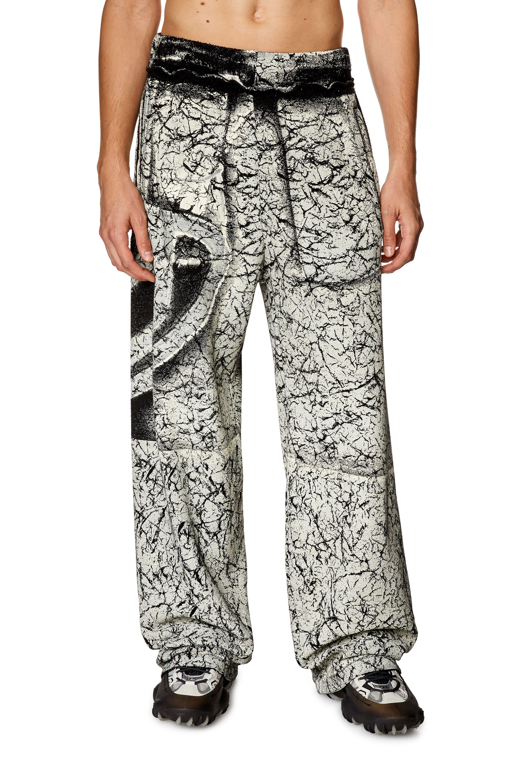 Shop Diesel Track Pants With Cracked Coating In Multicolor