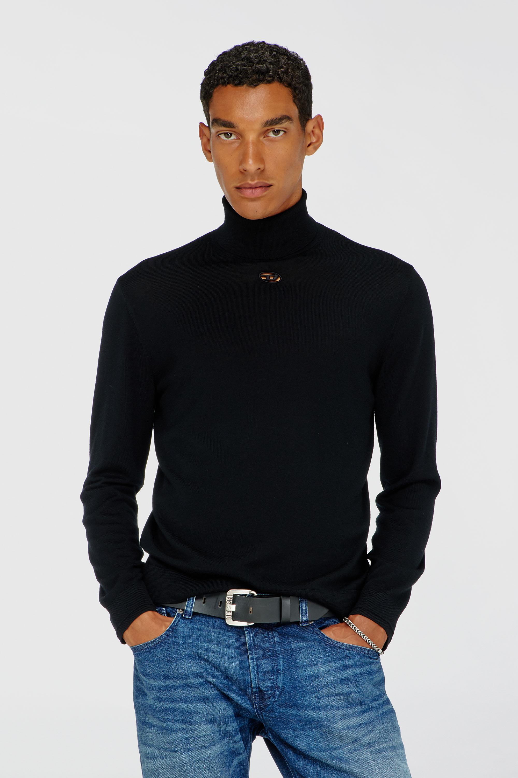 Diesel - Wool turtleneck jumper with cut-out logo - Knitwear - Man - Black