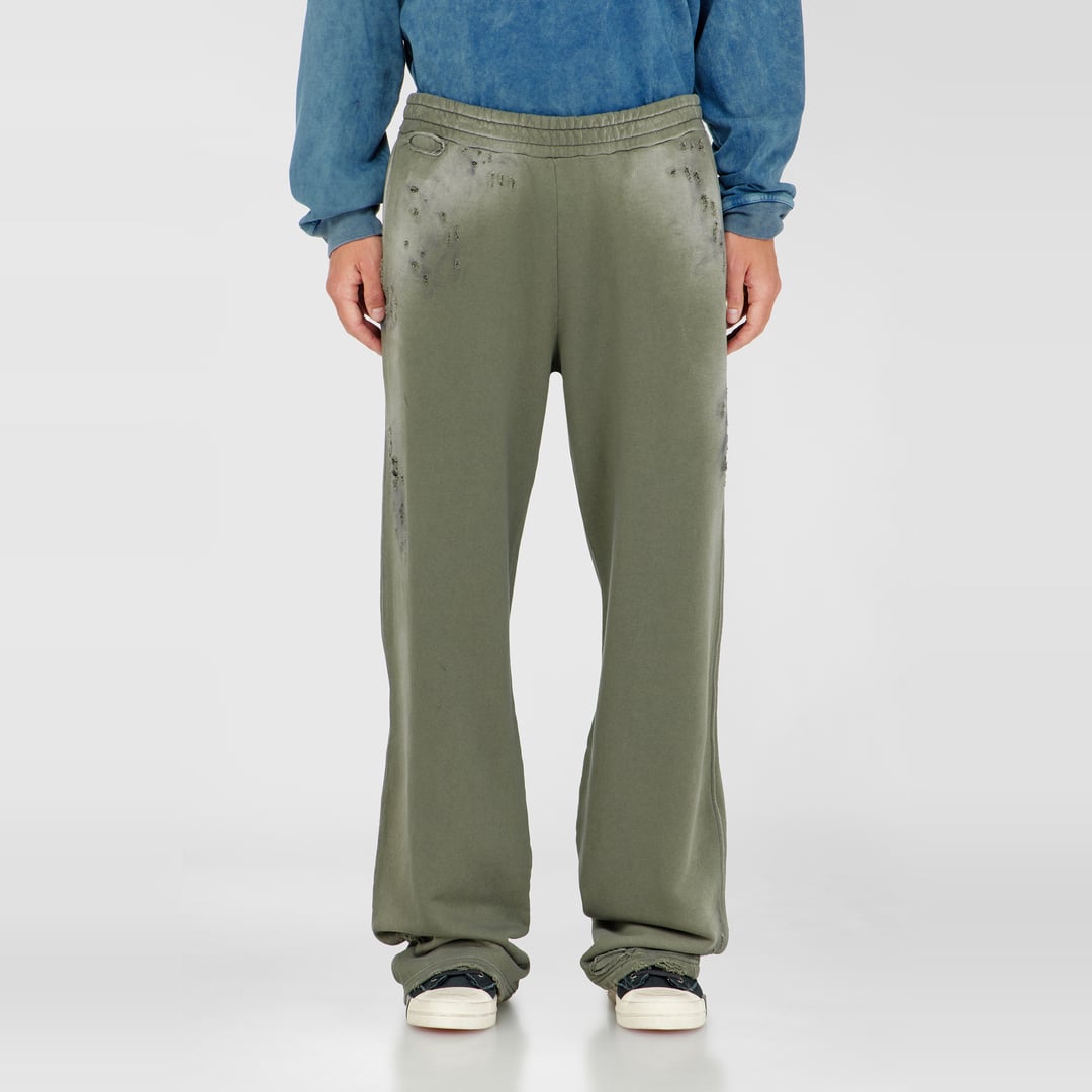 Diesel - Cotton sweatpants with destroyed effect - Pants - Man - Green
