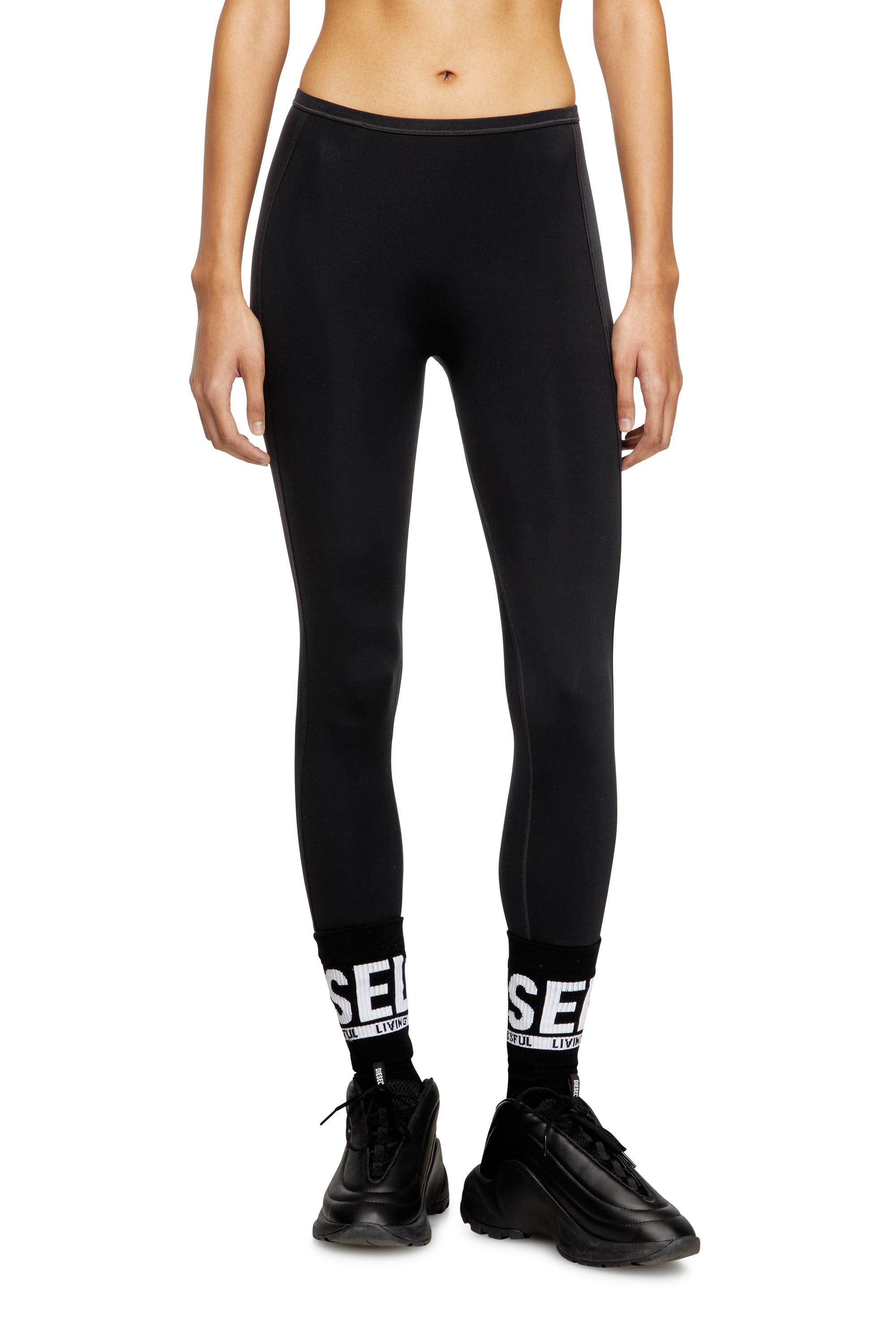 Diesel - MEREDITH-UTLT, Woman's Nylon leggings with cut-out back Oval D in Black - 4