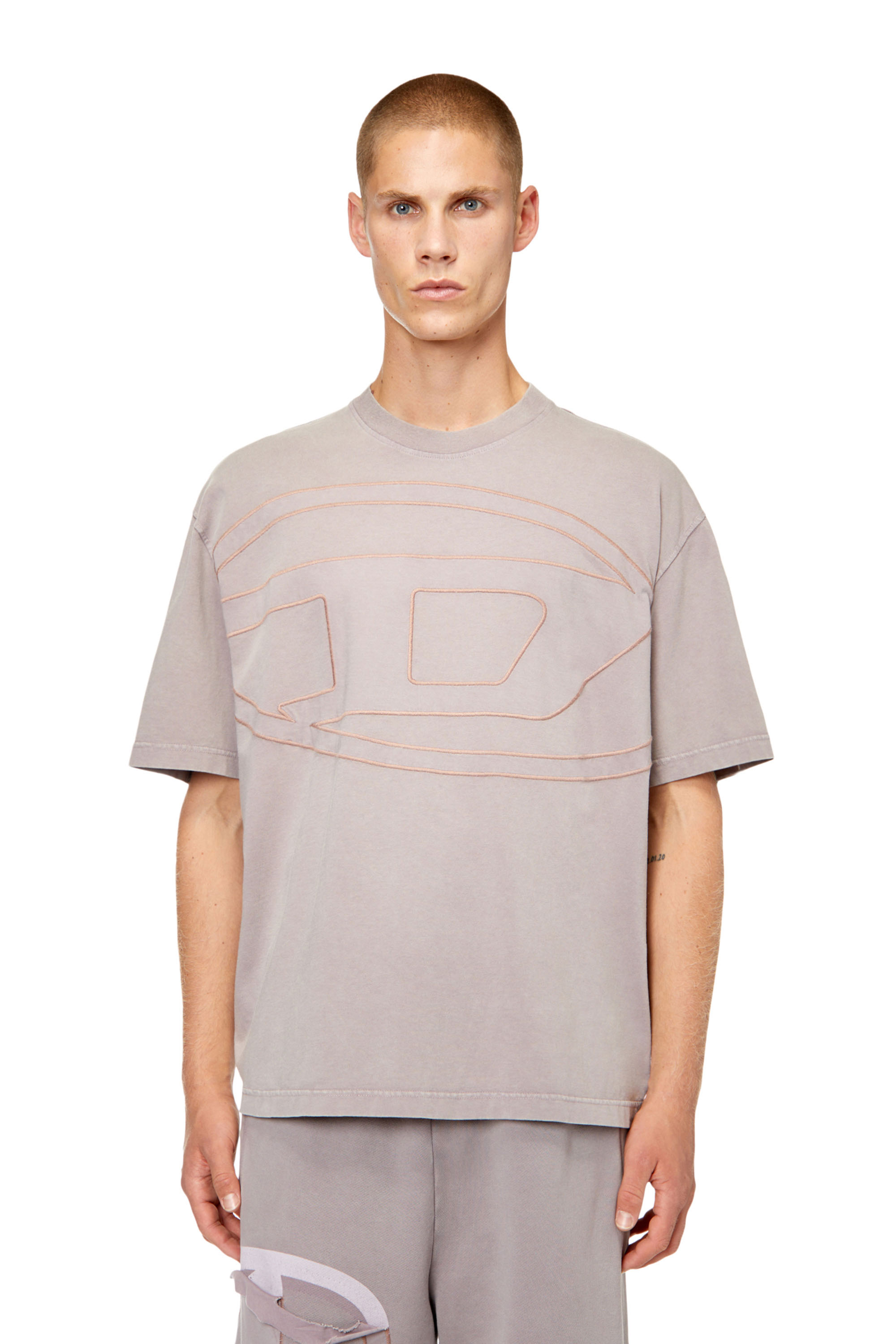 Diesel - T-shirt con maxi logo oval D effetto peel-off - T-Shirts - Uomo - Rosa