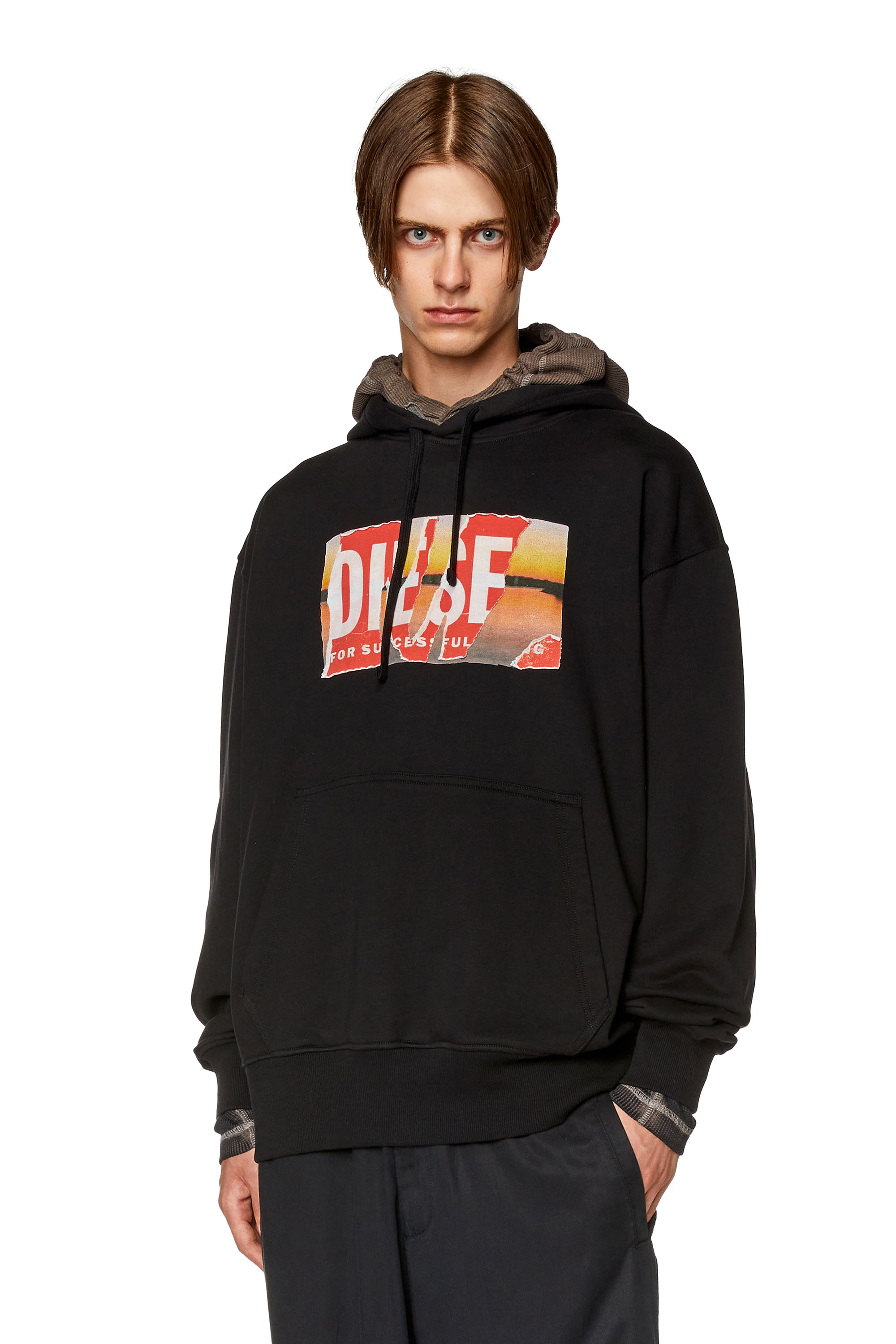 Diesel - Oversized hoodie with peel-off logo - Sweaters - Man - Black